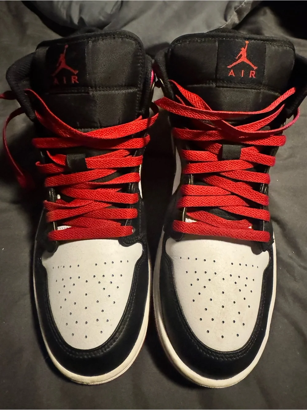 Jordan High-Top Sneakers in Black, White, and Red
